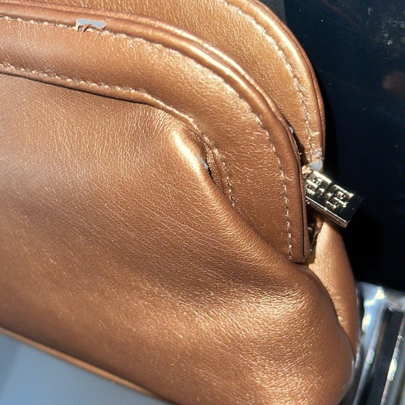 Givenchy cosmetics pouche and a wash towels comes in a set as a gift. Preloved - Picture 4 of 10